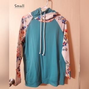 Pretty blue/teal with flower sleeves